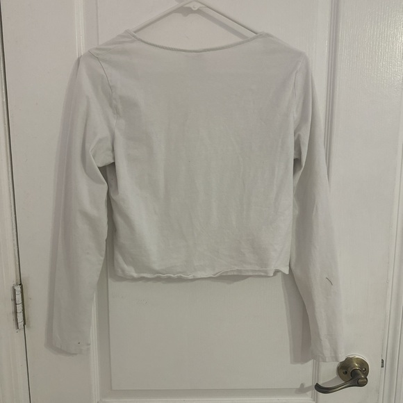 White long sleeve top, sleeves flare at the end - Picture 2 of 3